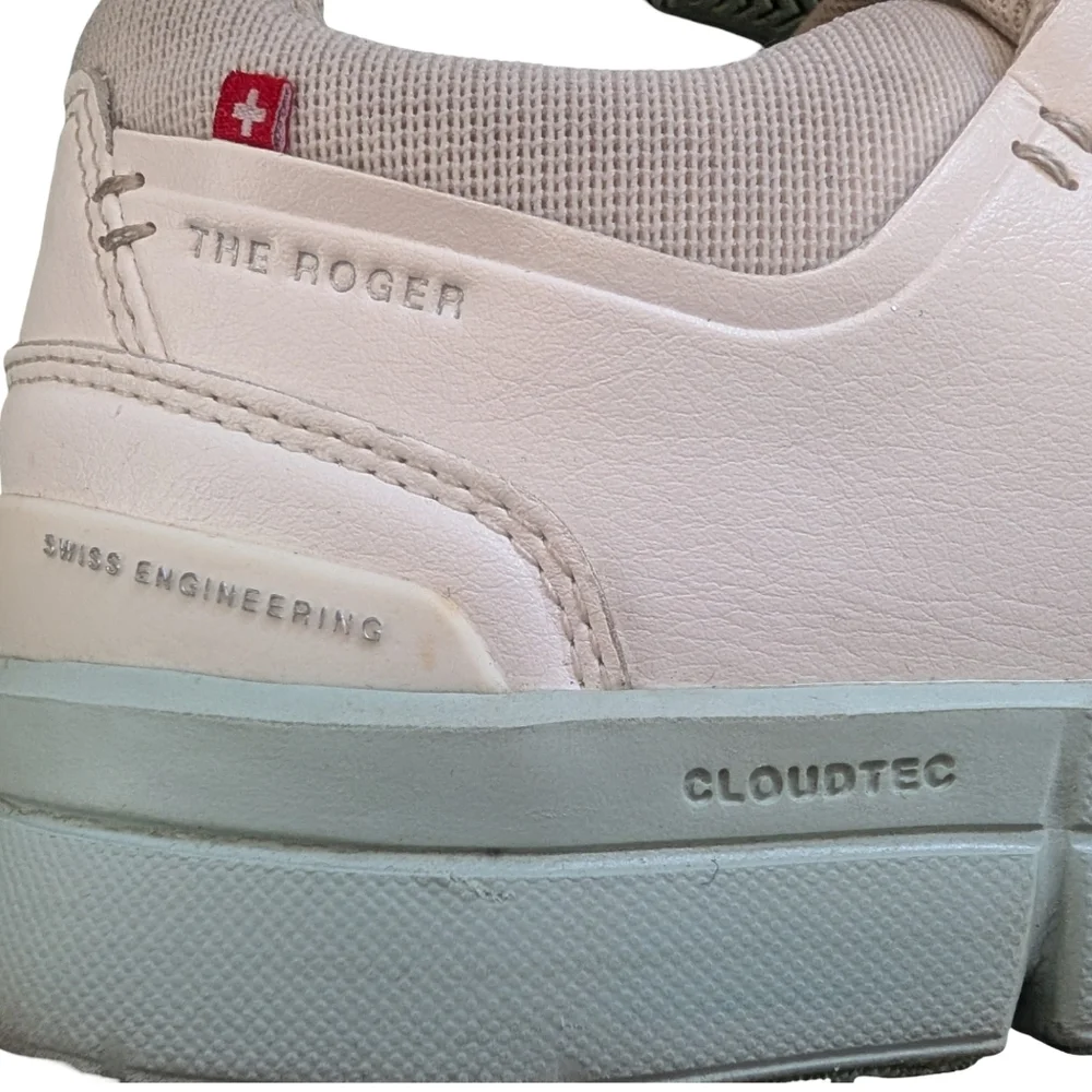 On Running The Roger sneakers in white with mint accent sole. Size 9